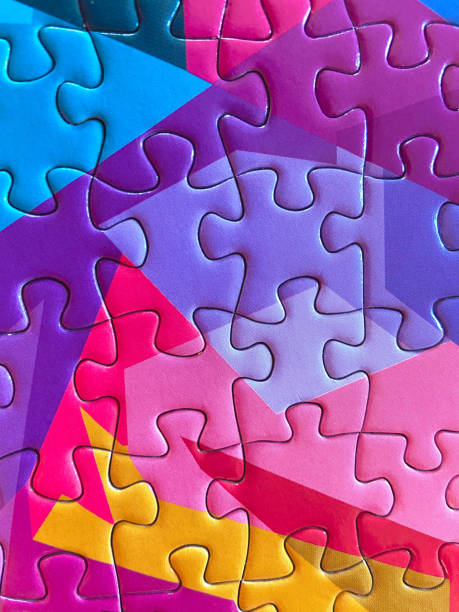 puzzle pieces - connected - board game piece leisure games blue isolated imagens e fotografias de stock