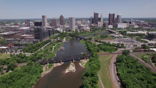 Aerial View Of Scioto River Moving Towards Columbus, Oh Downtown Buildings