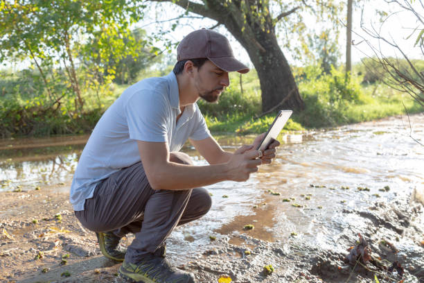 istock man by the stream with digital tablet 1495188160