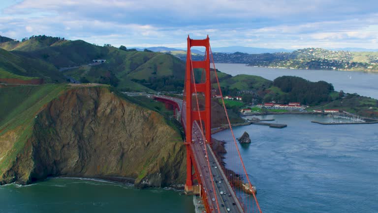 Aerial view of the Golden Gate Bridge. San Francisco, US. With the hilly Marin Headlands in the background. It connects the San Francisco Bay to Marin County. Shot on RED  weapon 8K.