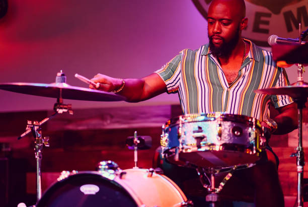 istock Drummer musician performing on stage 1495193934