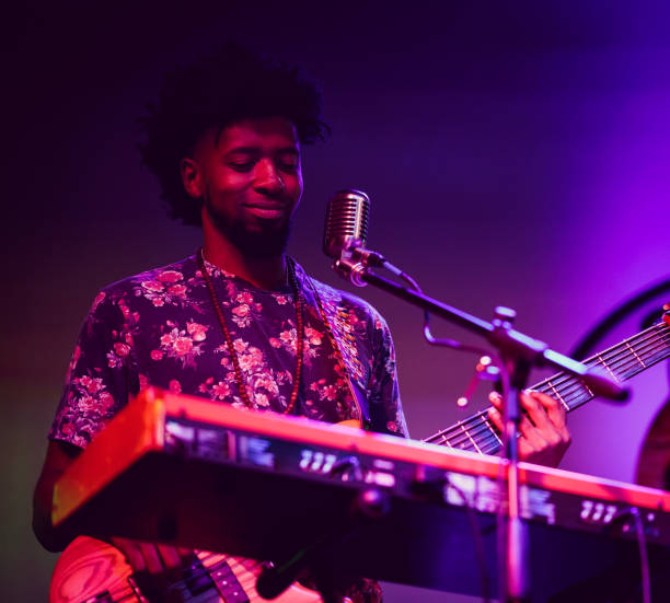 istock Musician performing on stage with guitar 1495194110