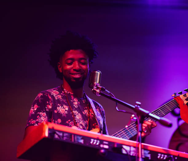 istock Musician performing on stage with guitar 1495194161