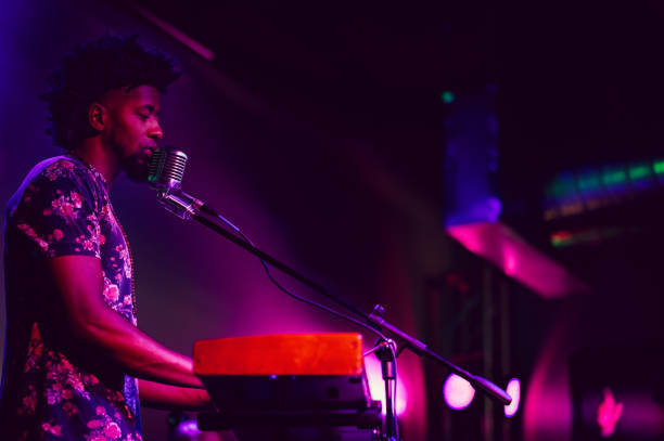 istock Musician performing on stage with keyboard 1495195332