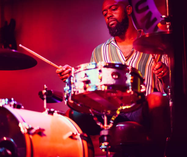 istock Drummer musician performing on stage 1495196292