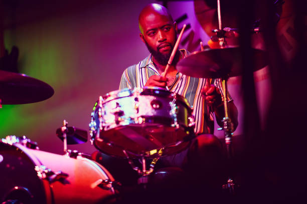 istock Drummer musician performing on stage 1495196433