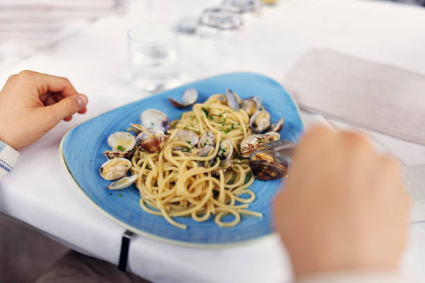 homemade spaghetti with clam, cheese and herb