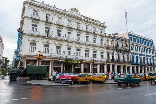 Havana, Cuba - October 21, 2017: Old Town in Havana, Cuba. Local People and Architecture with Old Cars