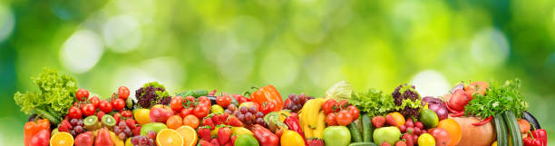 istock Collage fresh colored vegetables, fruits, berries on green background. 1495205197