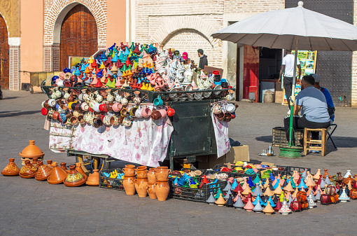 Market Stall at Djemma el Fna Square in Marrakesh, Morocco, where many tourist souvenirs are on display.