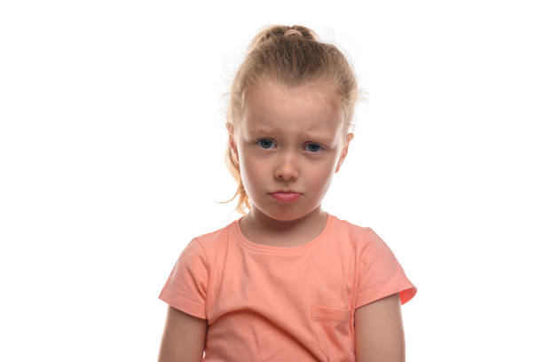 istock Sad little girl isolated on white. 1495216220