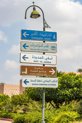 Road Sign to Casablanca in Marrakesh, Morocco, with other commercial places listed