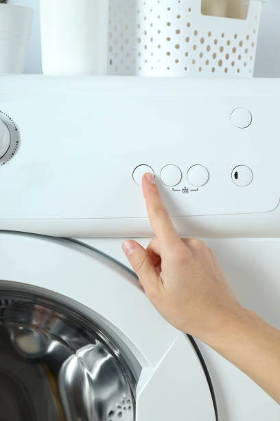 istock Concept of housework with washing machine close up 1495221440