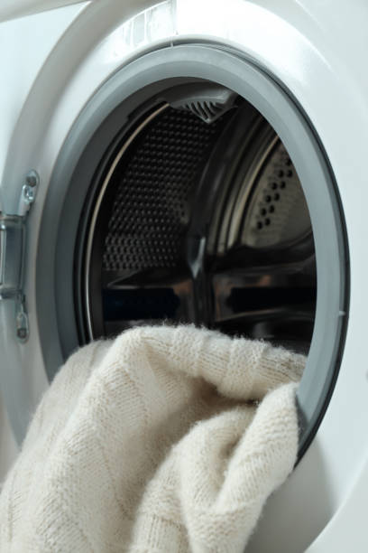 istock Concept of housework with washing machine close up 1495221877