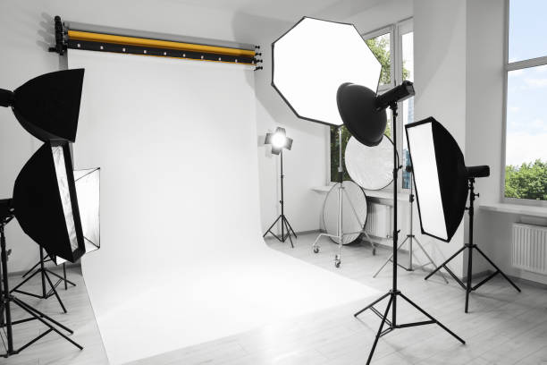 istock Interior of modern photo studio with professional lighting equipment 1495223002