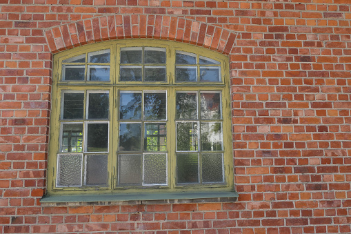 Full frame shot of a brick building with a window