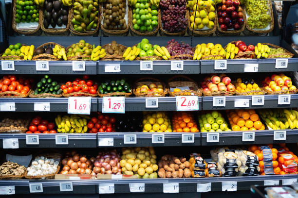 istock Raw fresh vegetables and fruits assortment on counter 1495224711