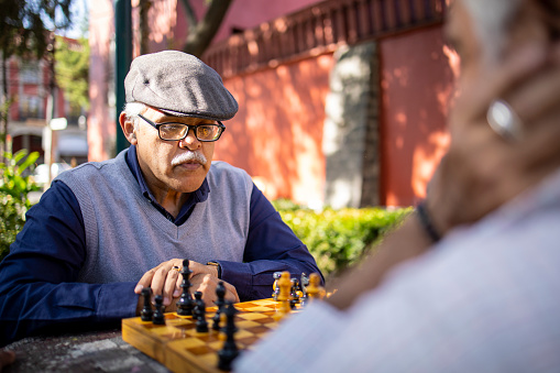 New York City, New York - June 28, 2016: Two unidentified man playing chess at the Union Square park in Manhatta, New York
