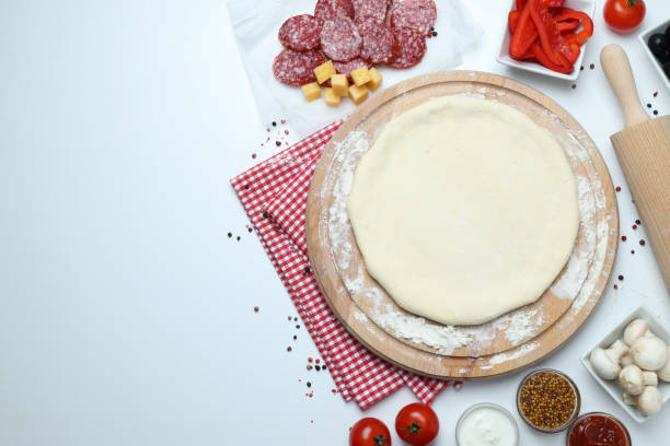 istock Concept of cooking pizza on white background 1495235497