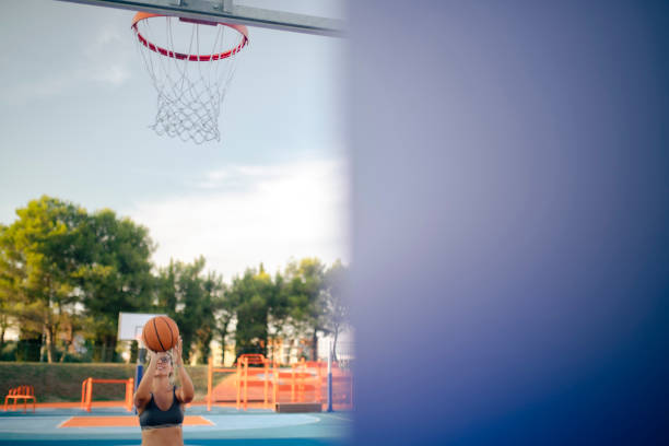 istock The woman plays basketball, copy space 1495236145