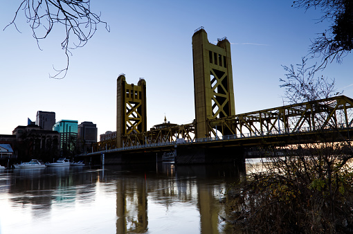 Early Morning Clear Blue Sky With Tower Bridge Reflected In Sacramento River