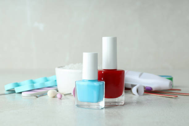 istock Concept of nail care with manicure accessories on light textured table 1495241082