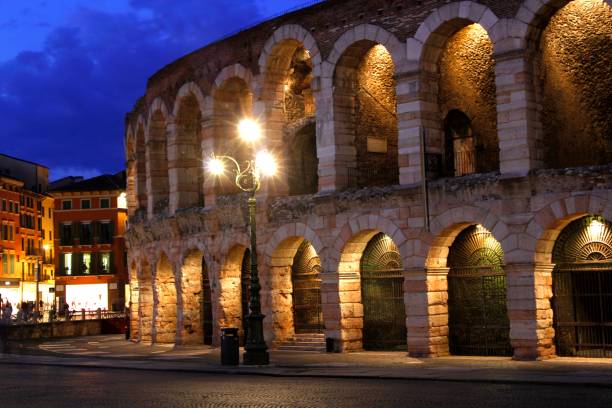 Night at the Arena in Verona The Arena in Verona Italy as seen at night, built in the 1st century AD verona opera stock pictures, royalty-free photos & images