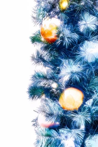 istock isolated pine christmas tree branches and orange decorations 1495246833