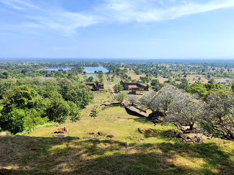 View towards the Mekong river from the upper level at Vat Phou sanctuary, a ruined Khmer Hindu temple complex in southern Laos and one of the oldest places of worship in Southeast Asia. It is at the base of mount Lingaparvata, some 6 kilometres from the Mekong in Champasak Province.