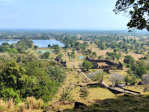View towards the Mekong river from the upper level at Vat Phou sanctuary, a ruined Khmer Hindu temple complex in southern Laos and one of the oldest places of worship in Southeast Asia. It is at the base of mount Lingaparvata, some 6 kilometres from the Mekong in Champasak Province.