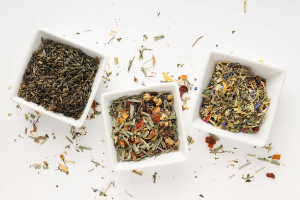 istock Concept of cooking tea with different types of tea on white background 1495255867