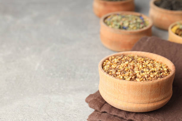 istock Concept of cooking tea with different types of tea on light textured background 1495256103