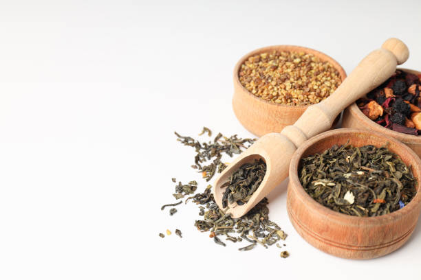 istock Concept of cooking tea with different types of tea on white background 1495256965