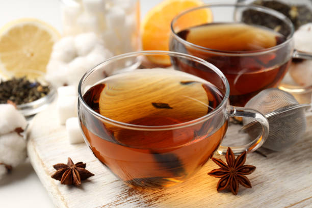 istock Concept of hot drink with tea, close up 1495257305