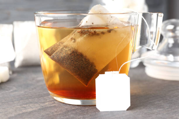 istock Concept of hot drink with tea, close up 1495258292
