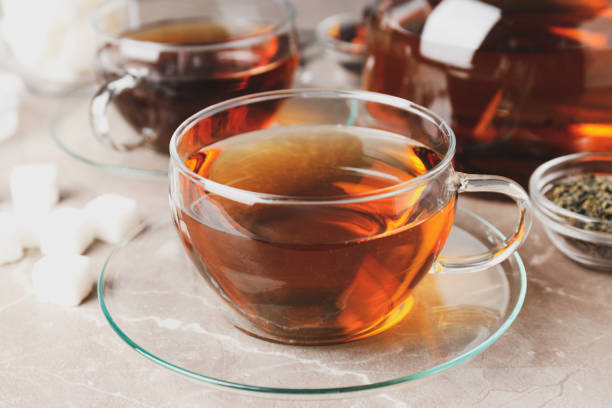 istock Concept of hot drink with tea, close up 1495258536