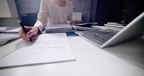 istock Public Tax Accountant Using Calculator 1495275495