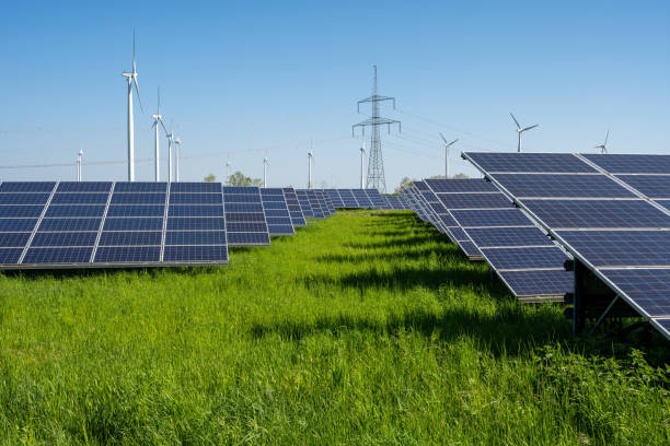 istock Solar panels, wind turbines and electricity pylons 1495275959
