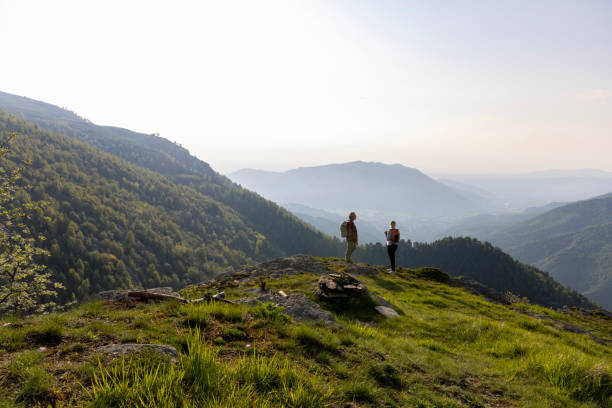 istock Senior couple hike on mountain ridge 1495282473