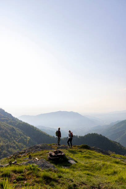 istock Senior couple hike on mountain ridge 1495282478