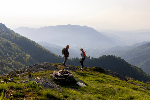 istock Senior couple hike on mountain ridge 1495282481