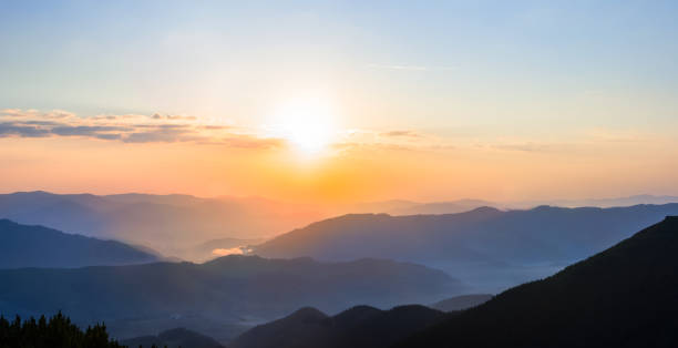 istock mountain valley in blue mist at the sunrise 1495283818