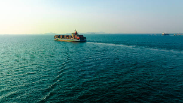 istock cargo container ship carrying in sea to import export goods and distributing products to dealer and consumers to international asia pacific and worldwide, 1495285062