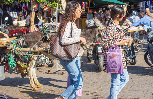 People shopping near Djemma el Fna Square in Marrakesh, Morocco