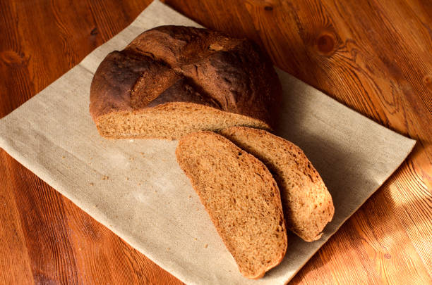 istock loaf of rye bread and cut two pieces 1495290644
