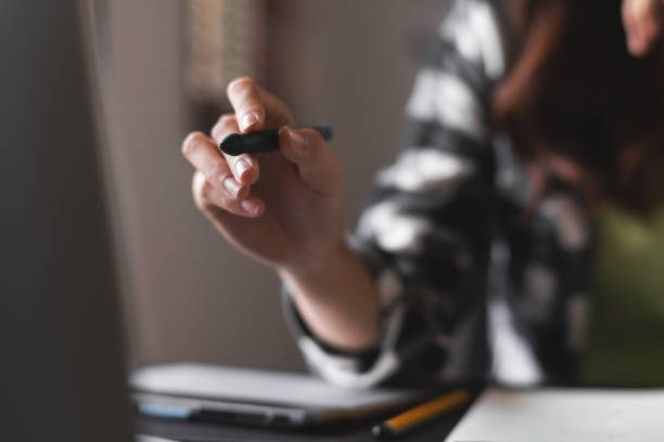 istock Close up of graphic designer hand working with creativity editor ideas designer concept. 1495292618