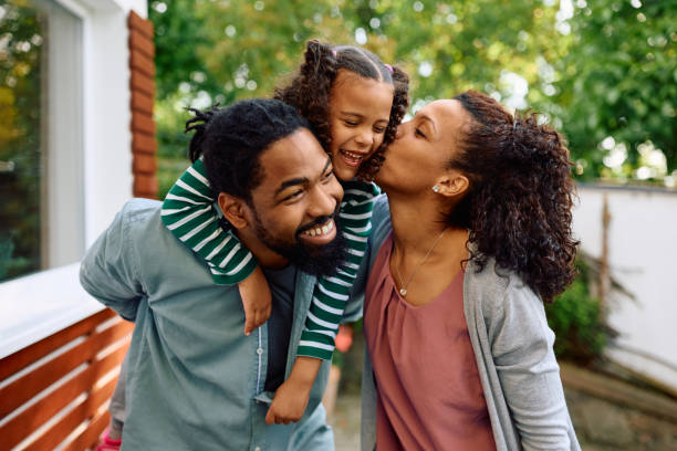 istock Loving black family having fun in their backyard. 1495293723