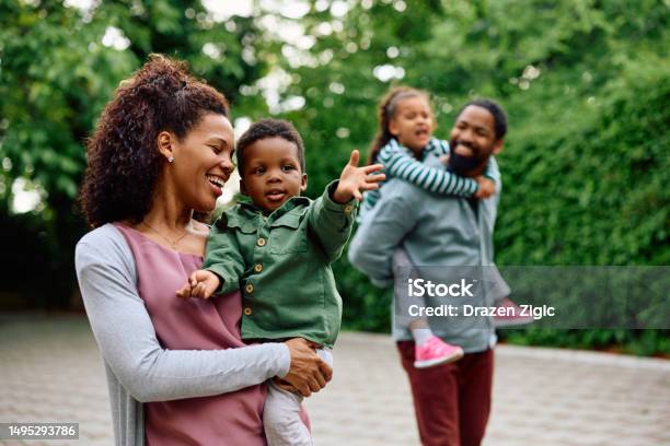 Lets Go Over There Mommy Stock Photo - Download Image Now - Family, Black People, Happiness