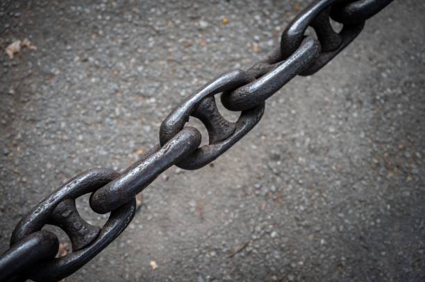 istock Closeup of a very thick metallic chain texture 1495297054