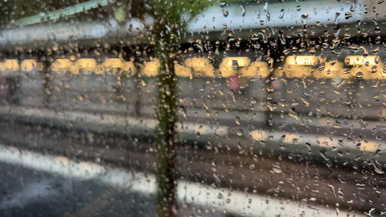 train departing from station with rainy windows in Paris